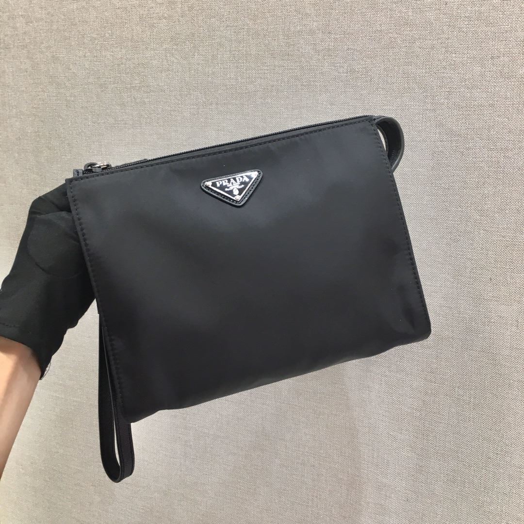Pra*a clutch bags